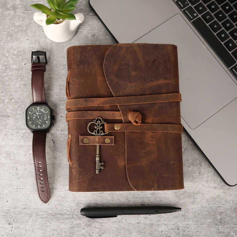 Handmade buffalo leather journal with deckle-edge pages and key closure