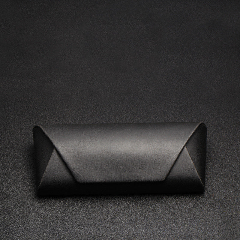 Black PU fold-over glasses case, closed, showing the envelope flap