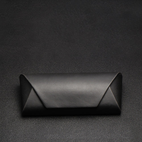 Black PU fold-over glasses case, closed, showing the envelope flap