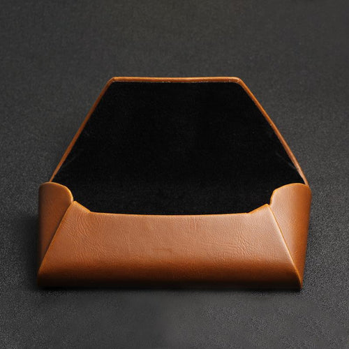 Fold-over glasses case open, showing the soft dark interior lining