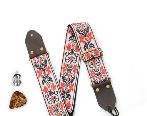 Woven guitar strap in the Coral & Cream jacquard pattern