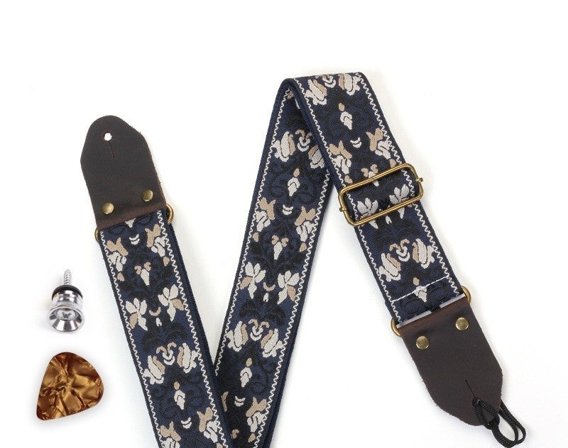 Woven guitar strap in the Navy Vine jacquard pattern