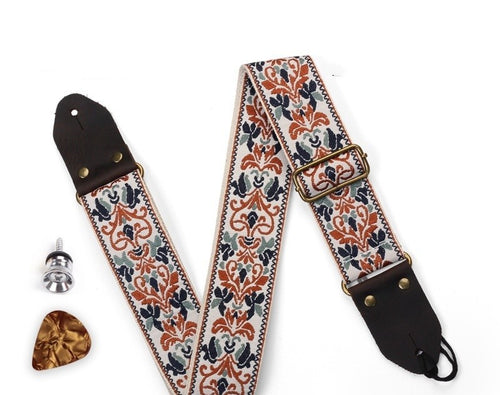 Woven guitar strap in the Rust & Navy jacquard pattern